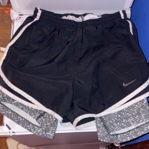 nike sri fit shorts with spandex underneath. size small.